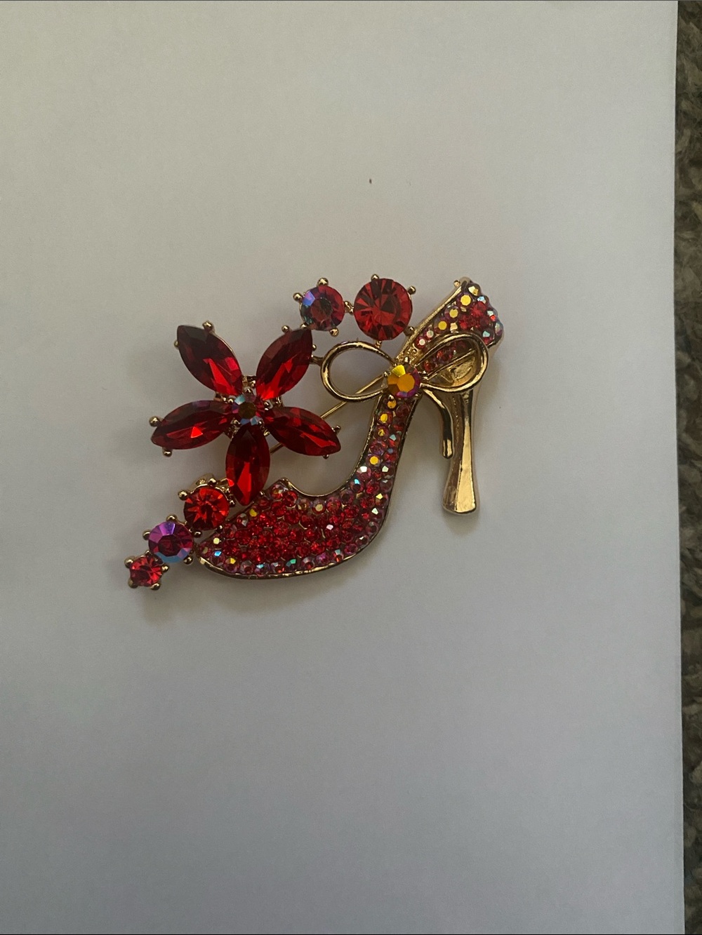 Gold-Tone Red Crystal High Heel Brooch with Floral Accent